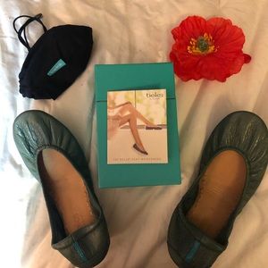 Green Tiek’s ballet flats.